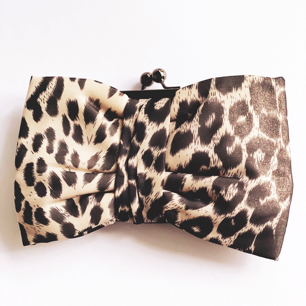 Betseyville Animal Print Bow Clutch